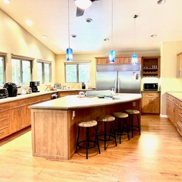 a kitchen with a wood floor